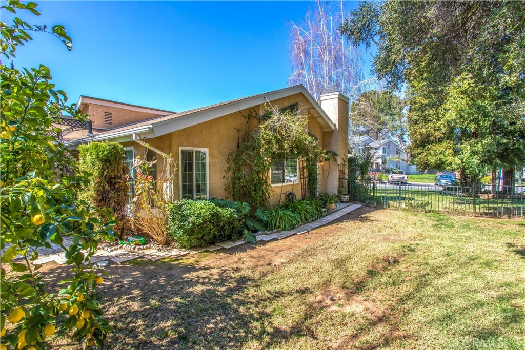 13503 Mulberry Circle Yucaipa, CA 92399 - Photo 23 of 28 a view of a house with a yard