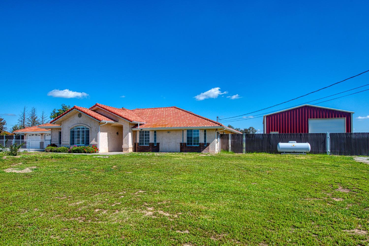 a view of a house with a yard
