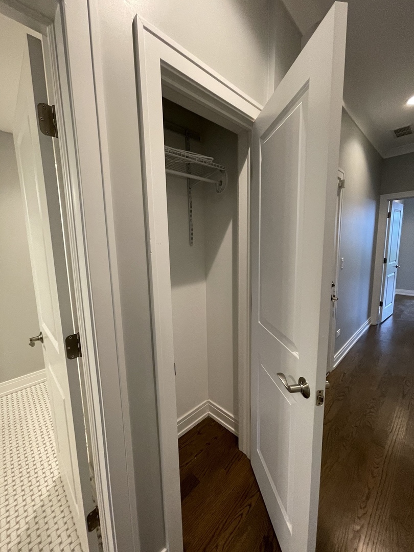 2036 West 18th Street, Unit 4 Chicago, IL 60608 - Photo 15 of 29 a view of a hallway with wooden floor and staircase