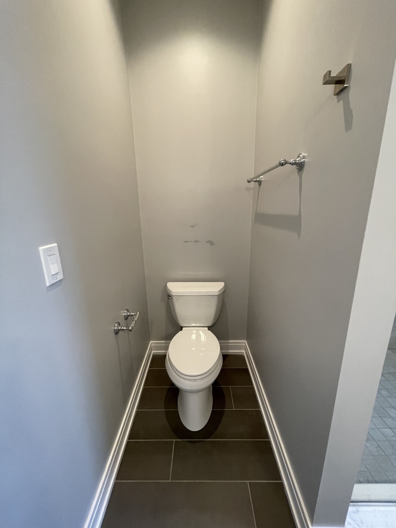 2036 West 18th Street, Unit 4 Chicago, IL 60608 - Photo 29 of 29 a bathroom with a toilet