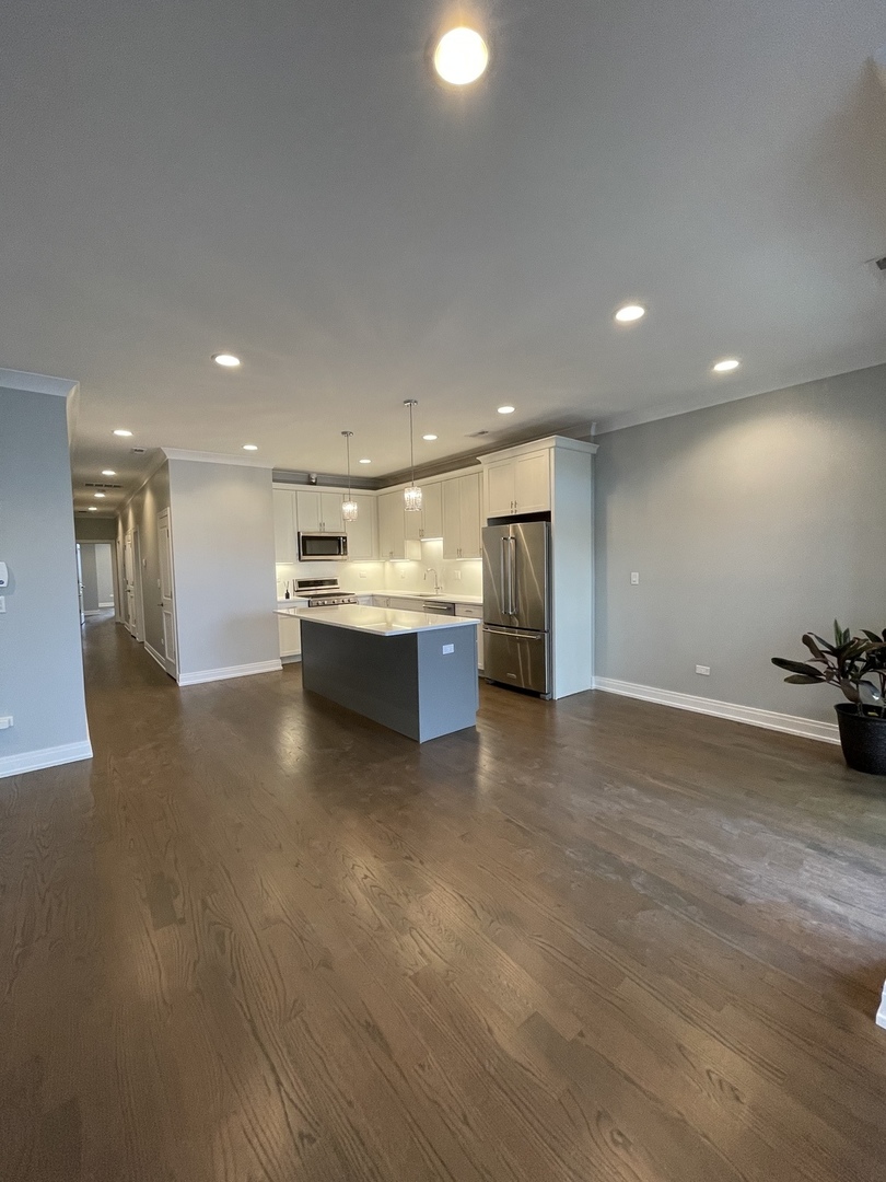 2036 West 18th Street, Unit 4 Chicago, IL 60608 - Photo 8 of 29 a view of an empty room with a window