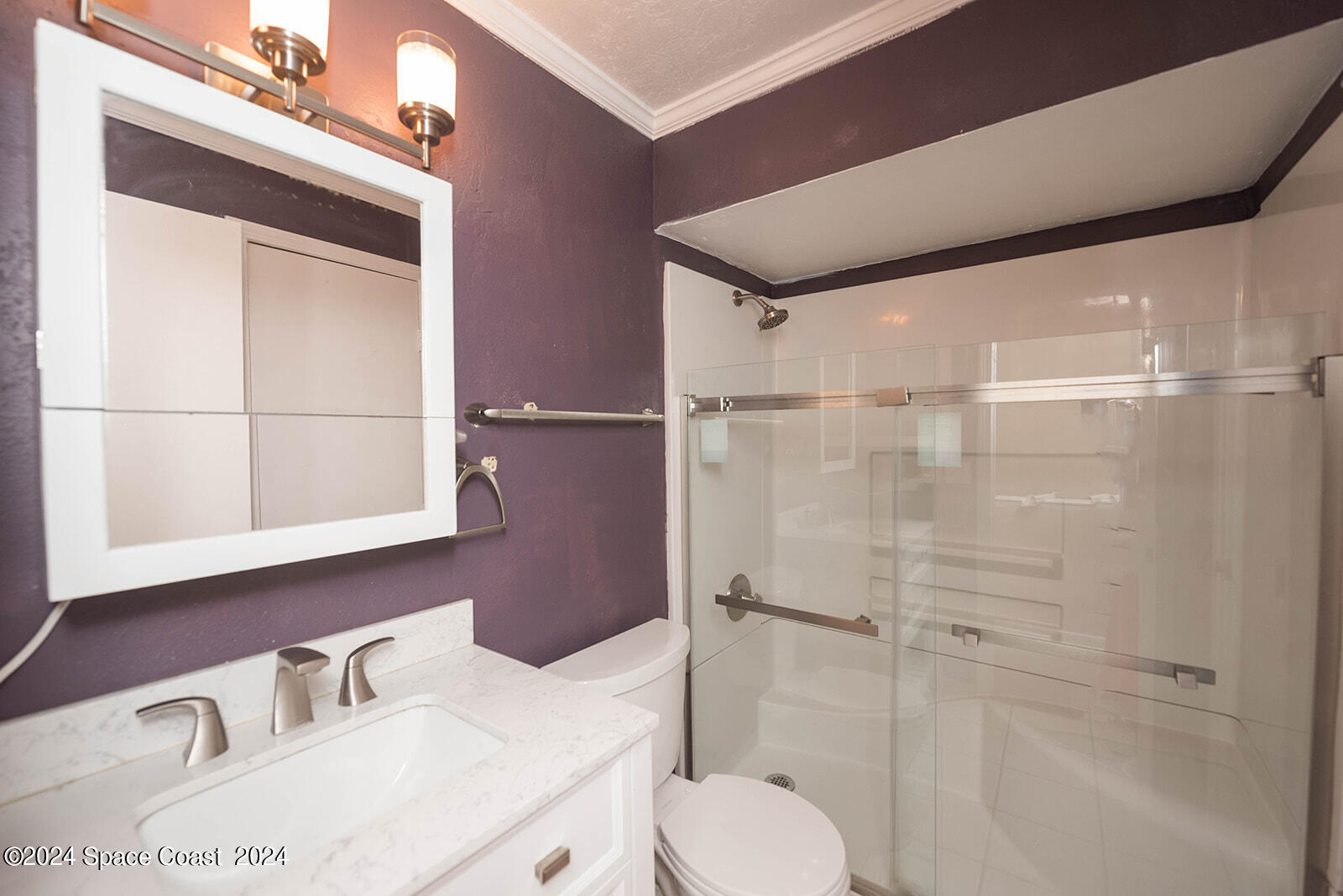 1880 Murrell Road, Unit F24 Rockledge, FL 32955 - Photo 26 of 45 a bathroom with a sink toilet and shower