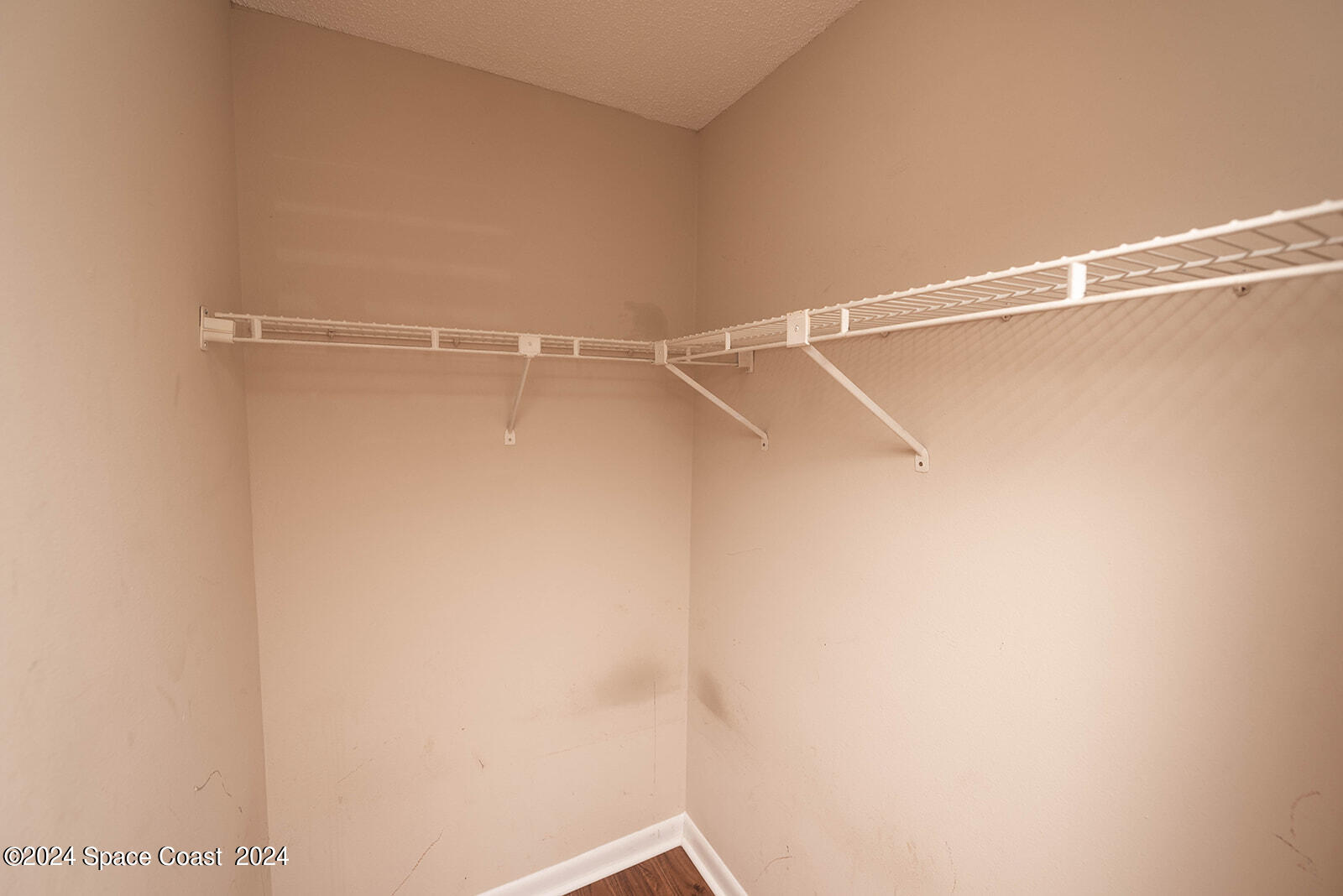 1880 Murrell Road, Unit F24 Rockledge, FL 32955 - Photo 27 of 45 a view of a room with racks on the wall