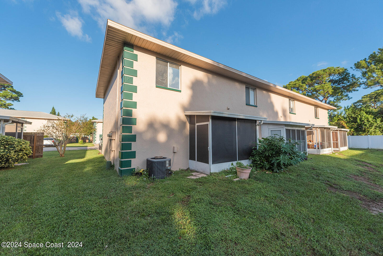 1880 Murrell Road, Unit F24 Rockledge, FL 32955 - Photo 35 of 45 a front view of a house with garden