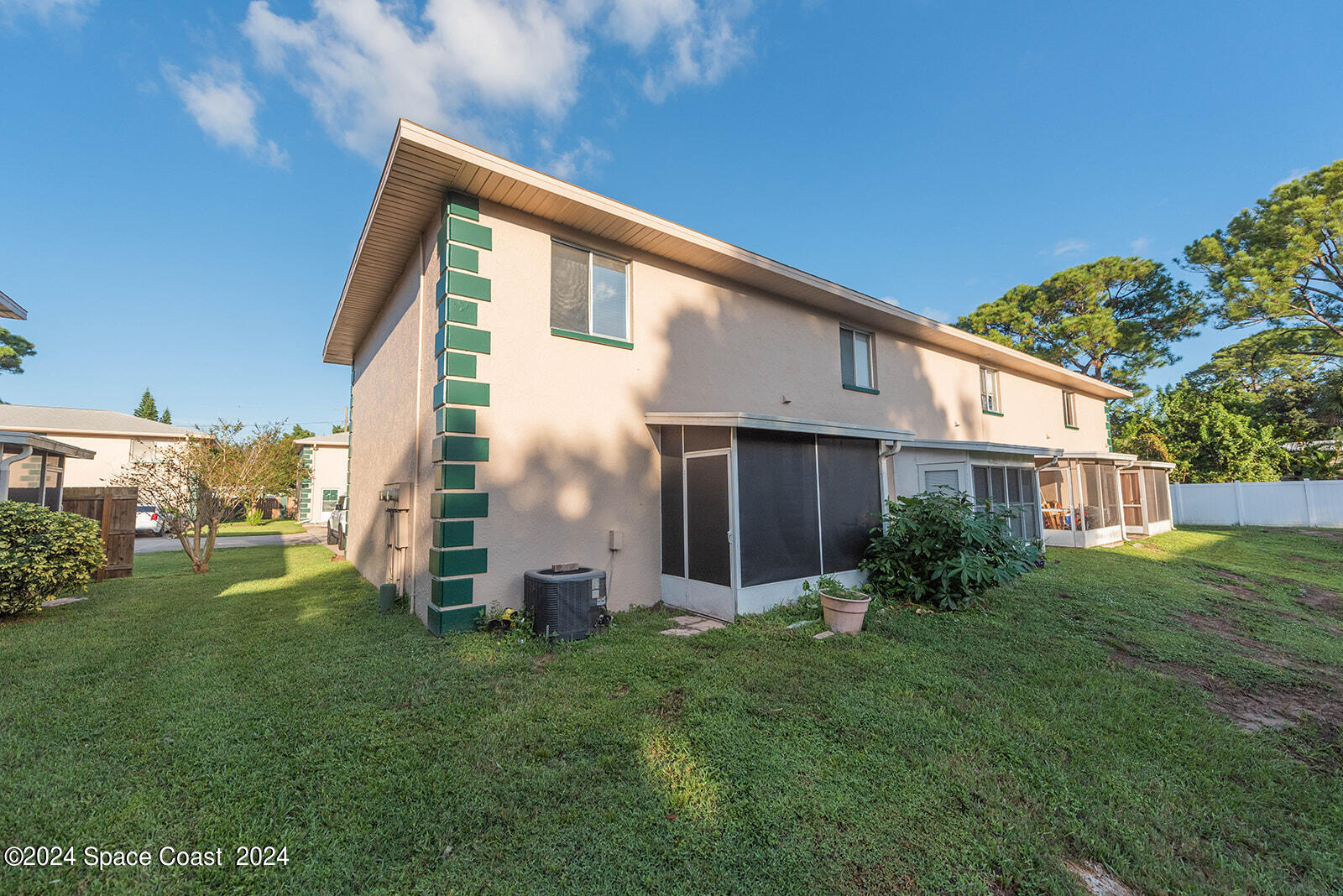 1880 Murrell Road, Unit F24 Rockledge, FL 32955 - Photo 36 of 45 a front view of a house with garden
