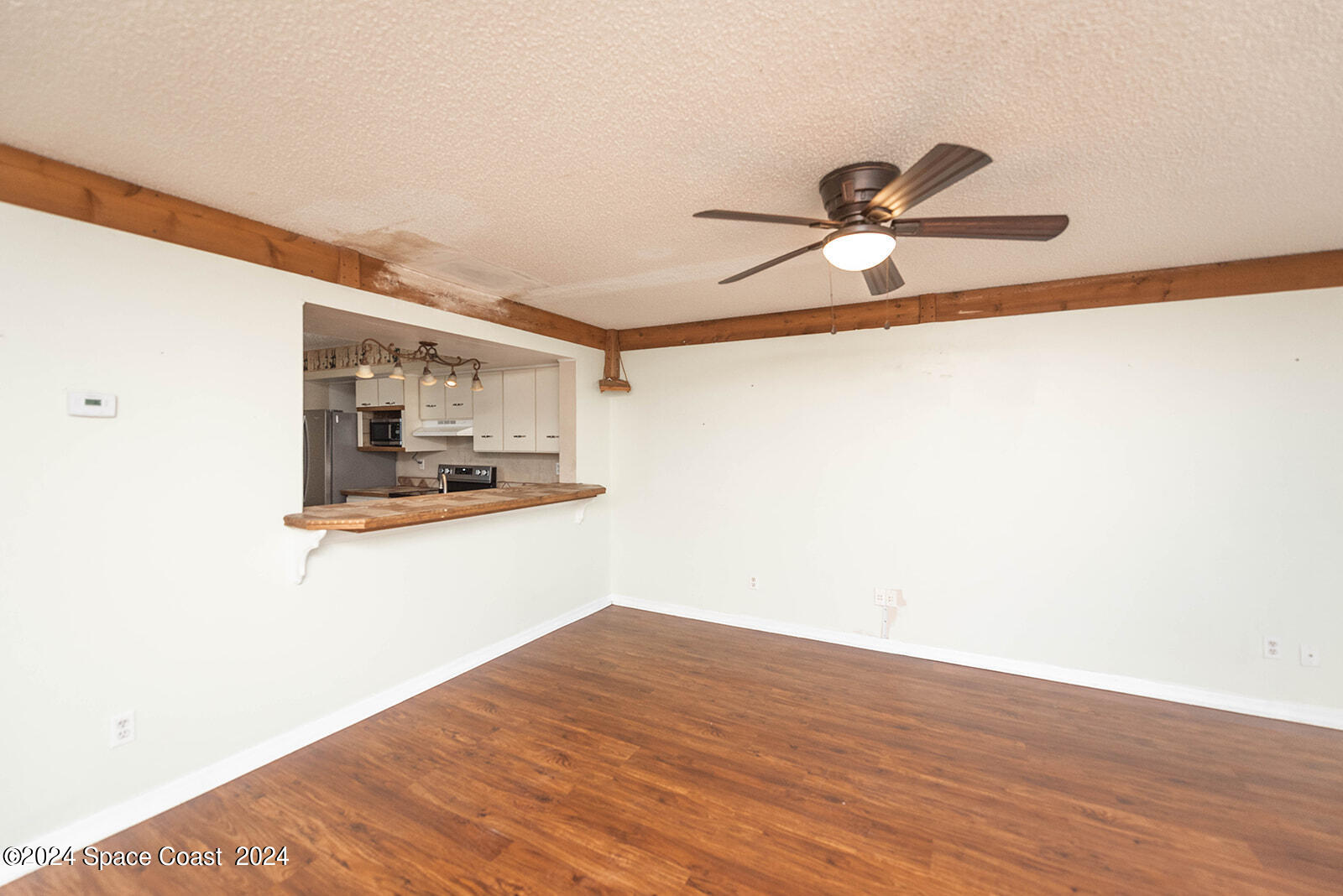1880 Murrell Road, Unit F24 Rockledge, FL 32955 - Photo 8 of 45 a view of a room with wooden floor