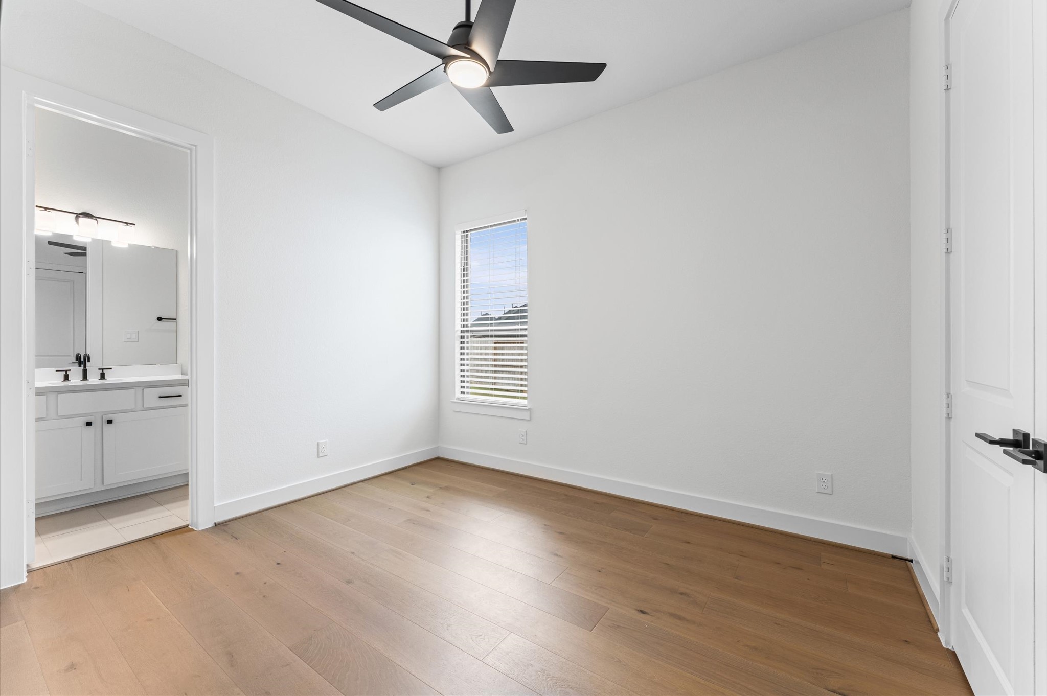 7327 Trial Rdg Drive Fulshear, TX 77441 - Photo 14 of 24 One of the secondary bedrooms has it's own ensuite, making it the perfect guest room or in-law suite.