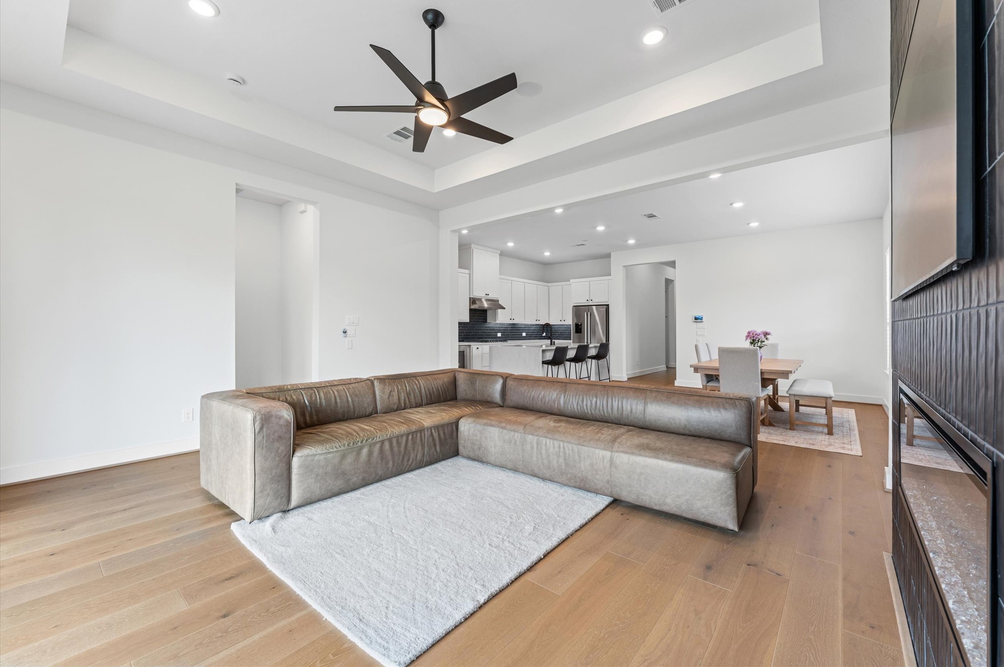 7327 Trial Rdg Drive Fulshear, TX 77441 - Photo 7 of 24 Engineered wood floors can be found throughout the home - no carpet.