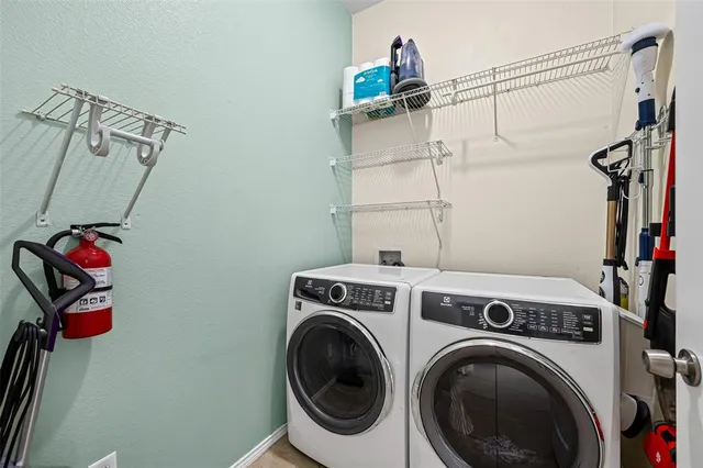 a bedroom with a bed and cabinets