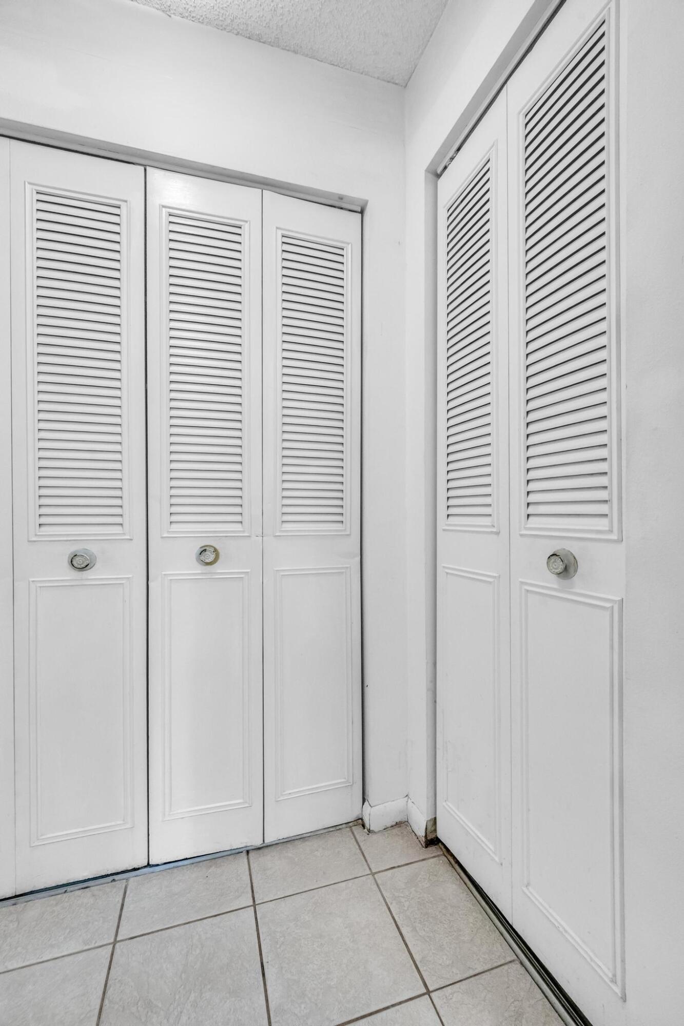 5406 Sunset Boulevard Fort Pierce, FL 34982 - Photo 11 of 33 an empty room with windows