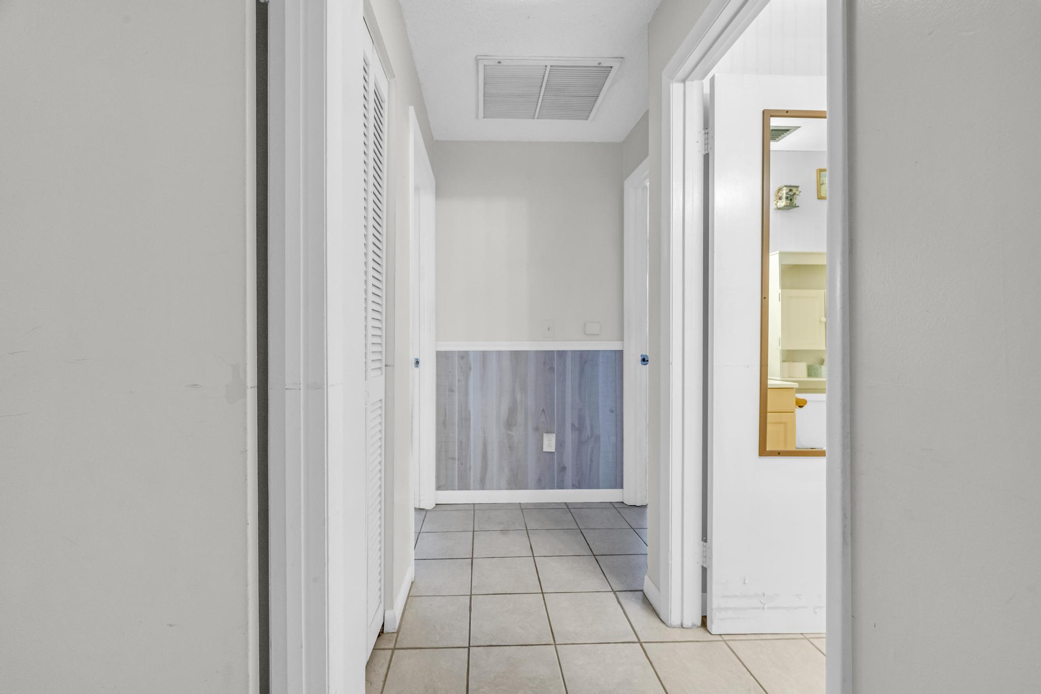 5406 Sunset Boulevard Fort Pierce, FL 34982 - Photo 12 of 33 a view of an entryway with wooden floor