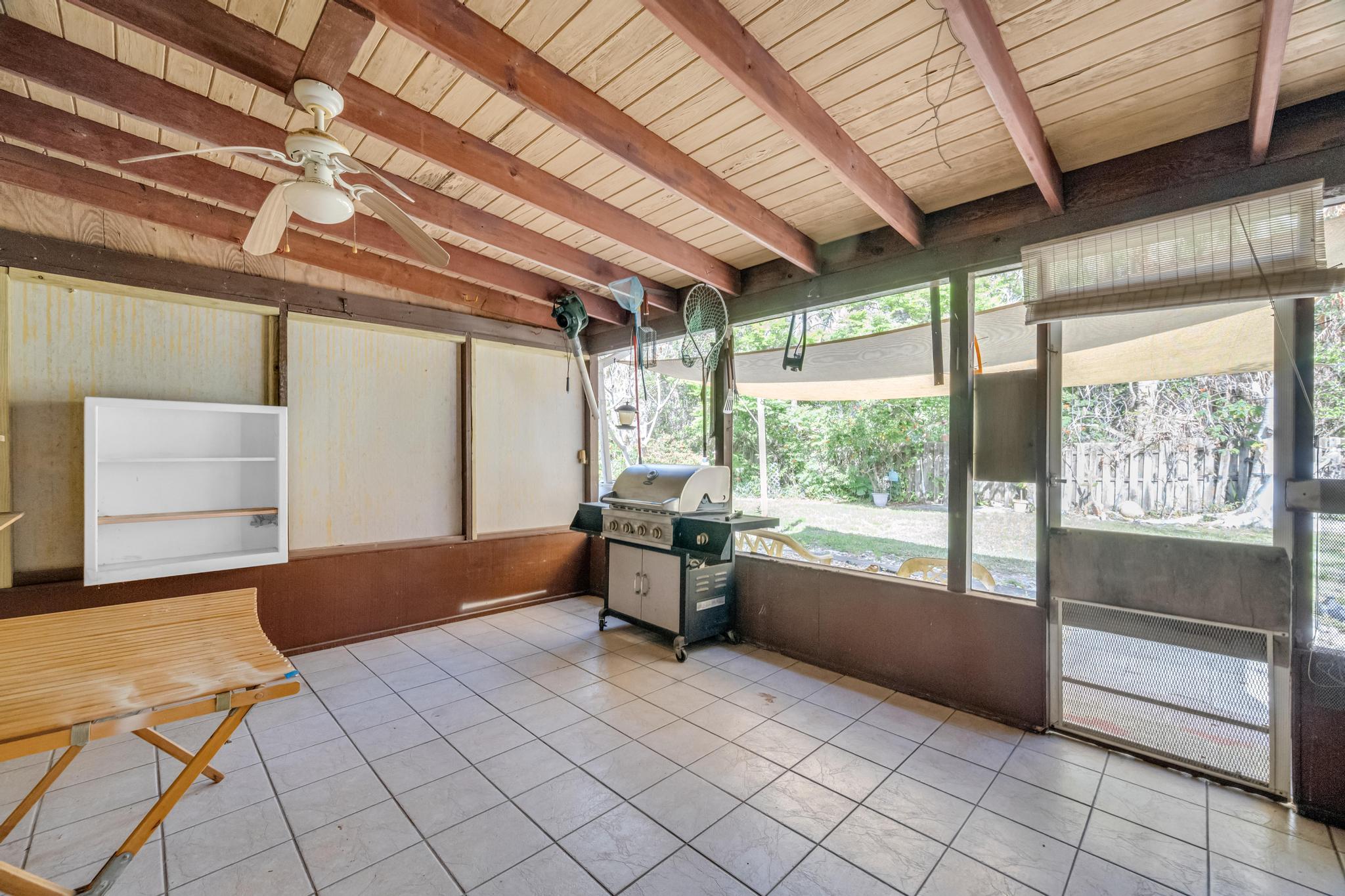 5406 Sunset Boulevard Fort Pierce, FL 34982 - Photo 21 of 33 a room with window and furniture