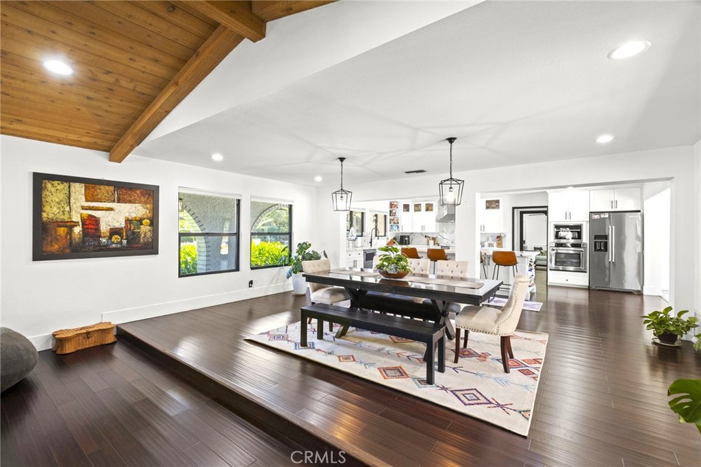 7710 Broadacre Place Riverside, CA 92504 - Photo 11 of 65 a living room with furniture and a wooden floor