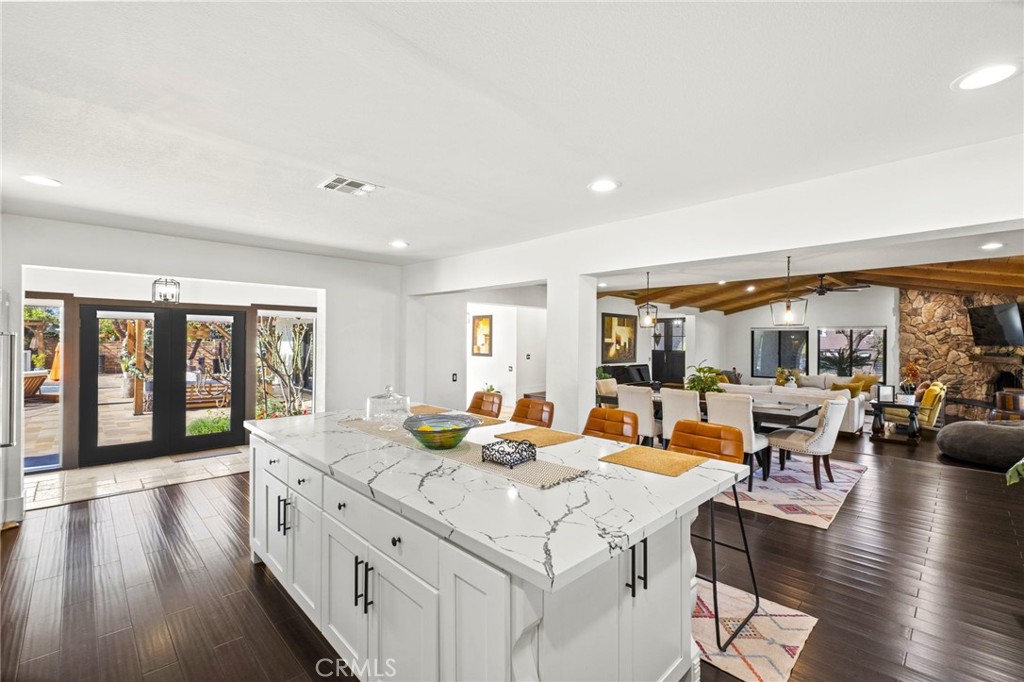 7710 Broadacre Place Riverside, CA 92504 - Photo 12 of 65 a living room with furniture and large windows