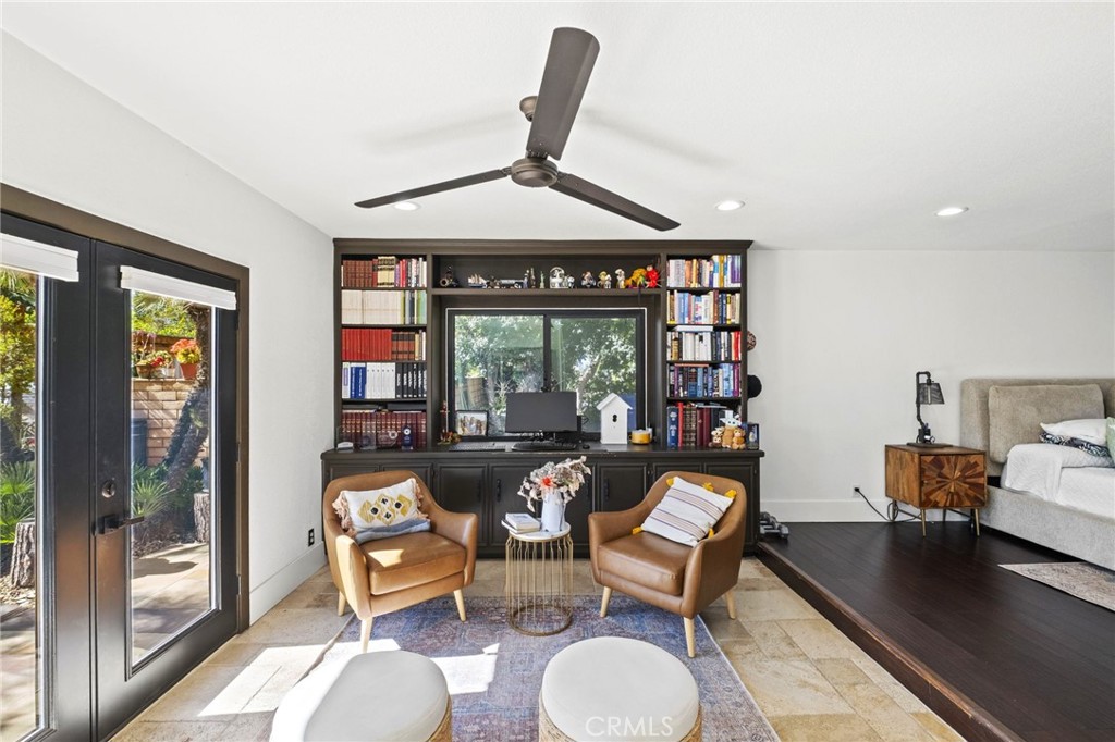 7710 Broadacre Place Riverside, CA 92504 - Photo 19 of 65 a living room with furniture and large windows
