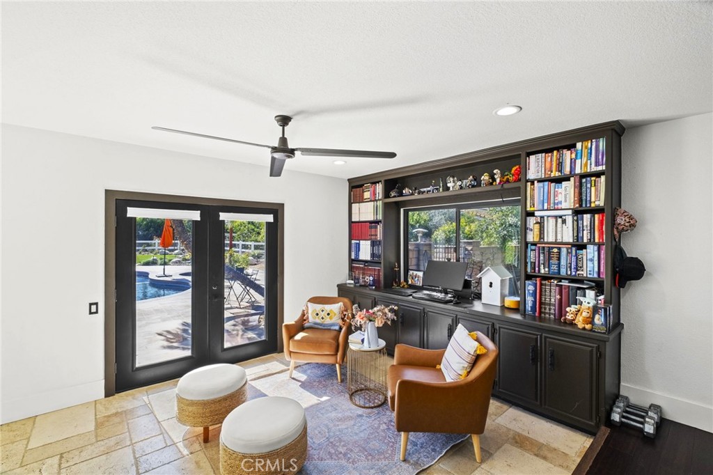 7710 Broadacre Place Riverside, CA 92504 - Photo 20 of 65 a living room with furniture and a large window