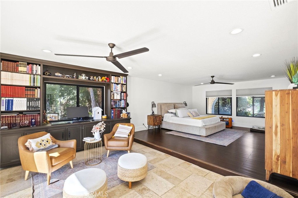7710 Broadacre Place Riverside, CA 92504 - Photo 24 of 65 a living room with furniture and a large window