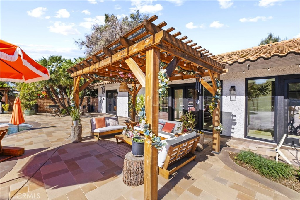 7710 Broadacre Place Riverside, CA 92504 - Photo 36 of 65 a view of a building with sitting area