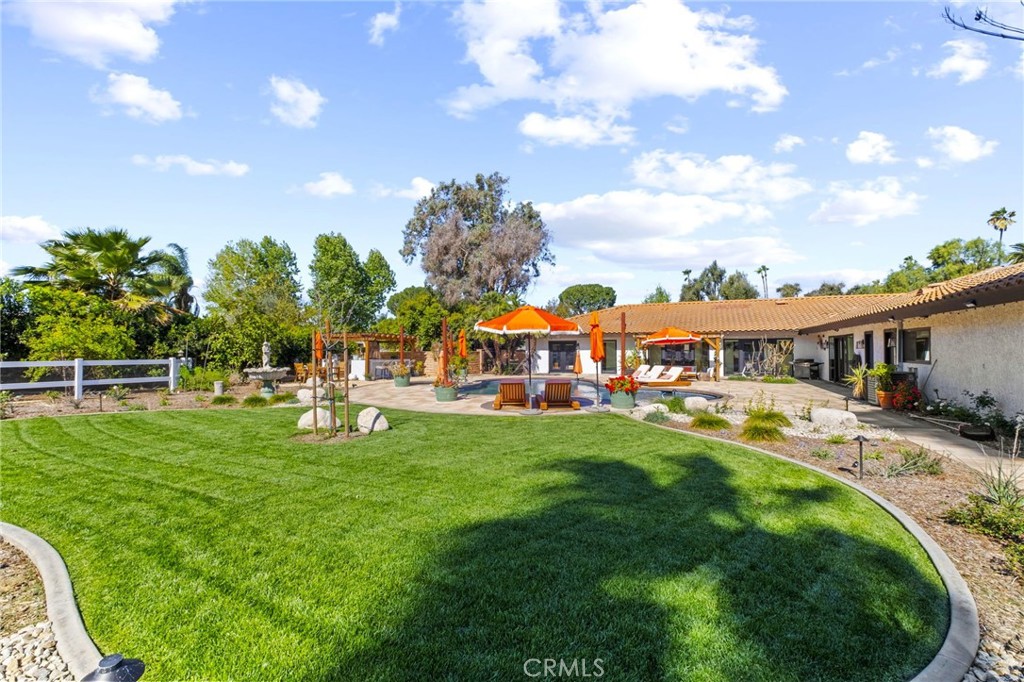 7710 Broadacre Place Riverside, CA 92504 - Photo 43 of 65 a front view of house with yard and outdoor seating