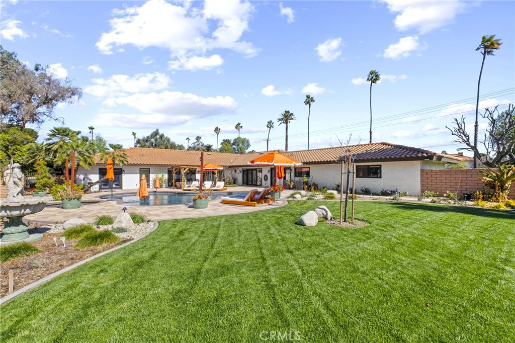 7710 Broadacre Place Riverside, CA 92504 - Photo 44 of 65 a view of an house with backyard space and balcony