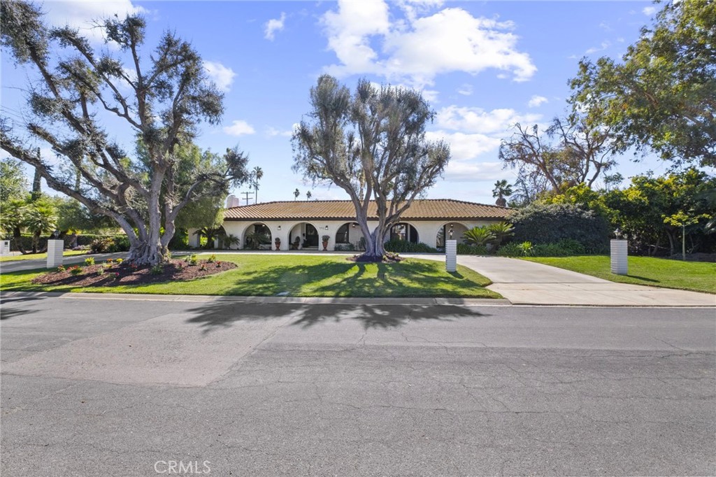 7710 Broadacre Place Riverside, CA 92504 - Photo 5 of 65 a view of road with house in front of it