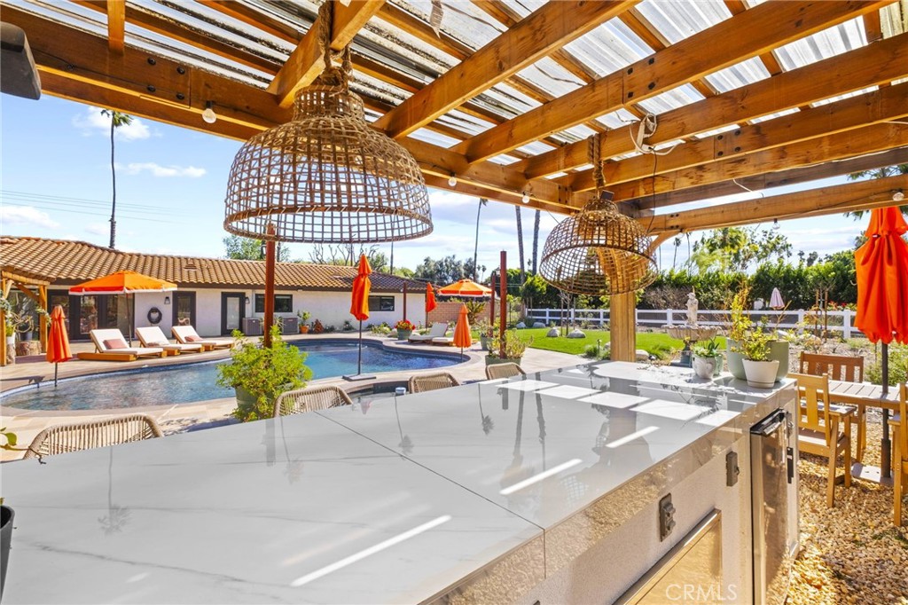 7710 Broadacre Place Riverside, CA 92504 - Photo 53 of 65 a view of a swimming pool with a patio