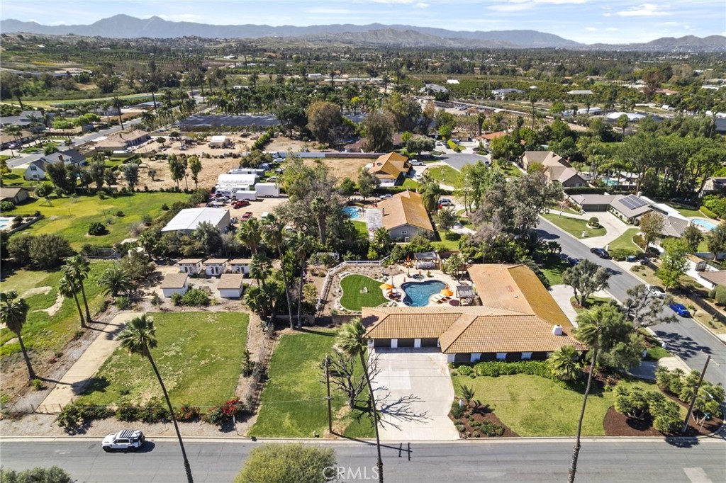 7710 Broadacre Place Riverside, CA 92504 - Photo 58 of 65 an aerial view of residential houses with outdoor space and parking