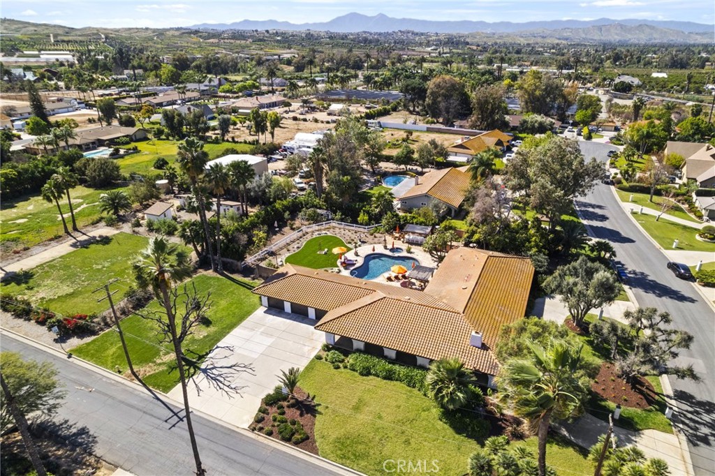 7710 Broadacre Place Riverside, CA 92504 - Photo 59 of 65 an aerial view of residential houses with outdoor space