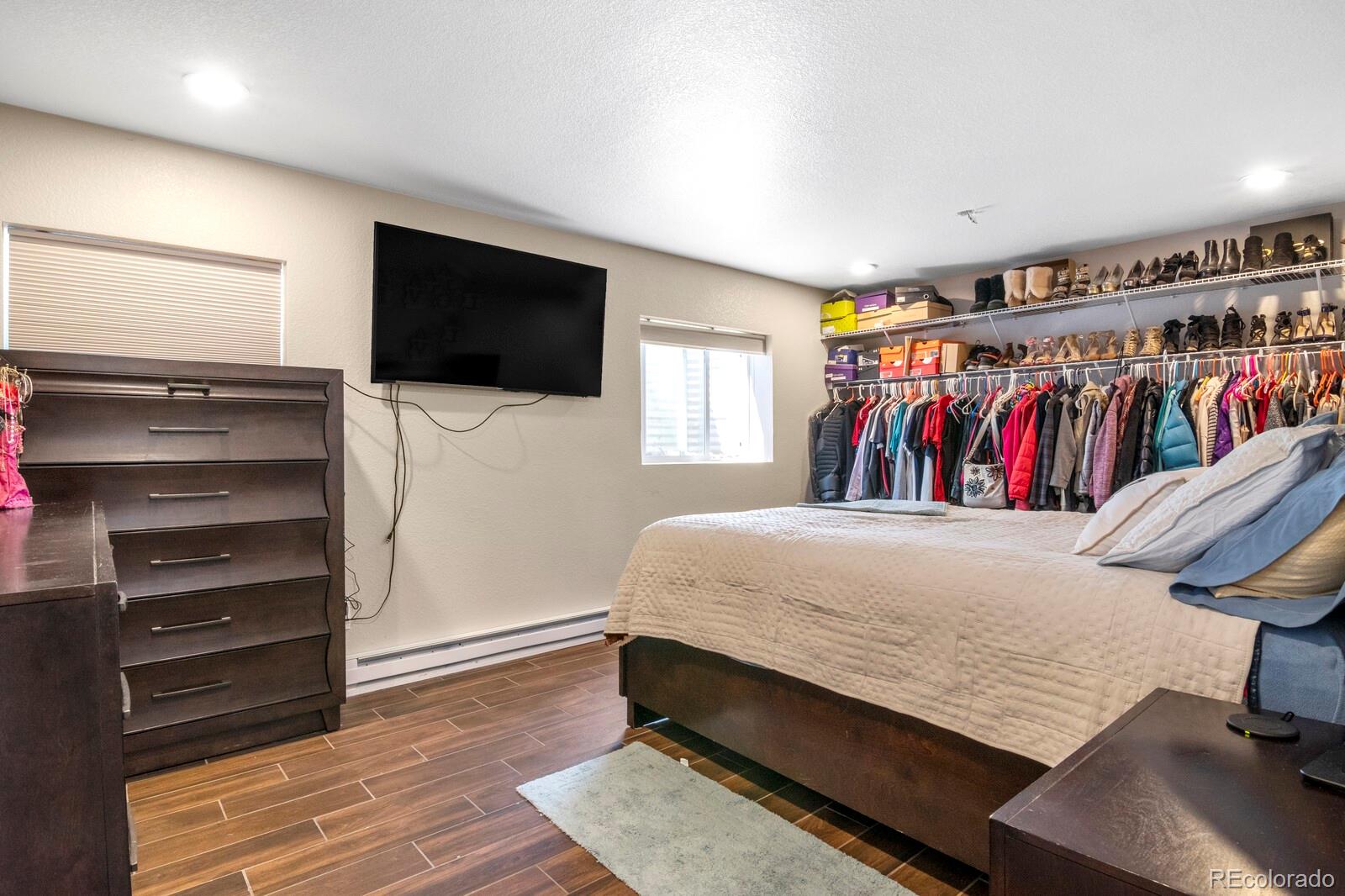 1065 Modred Street Lafayette, CO 80026 - Photo 24 of 34 a bed room with a bed and a television