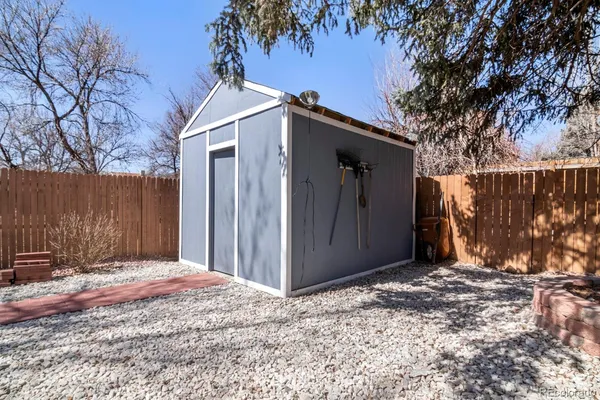 a view of a backyard of the house