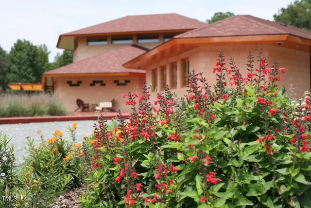 a view of a chairs and table in the room