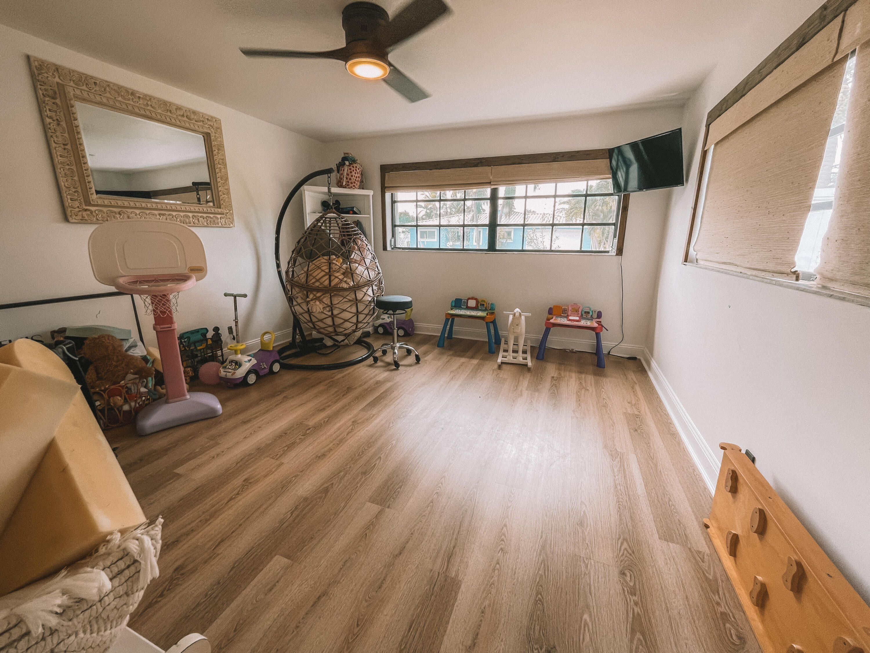 2171 Northeast 44th Court Lighthouse Point, FL 33064 - Photo 20 of 24 a living room with furniture and a wooden floor