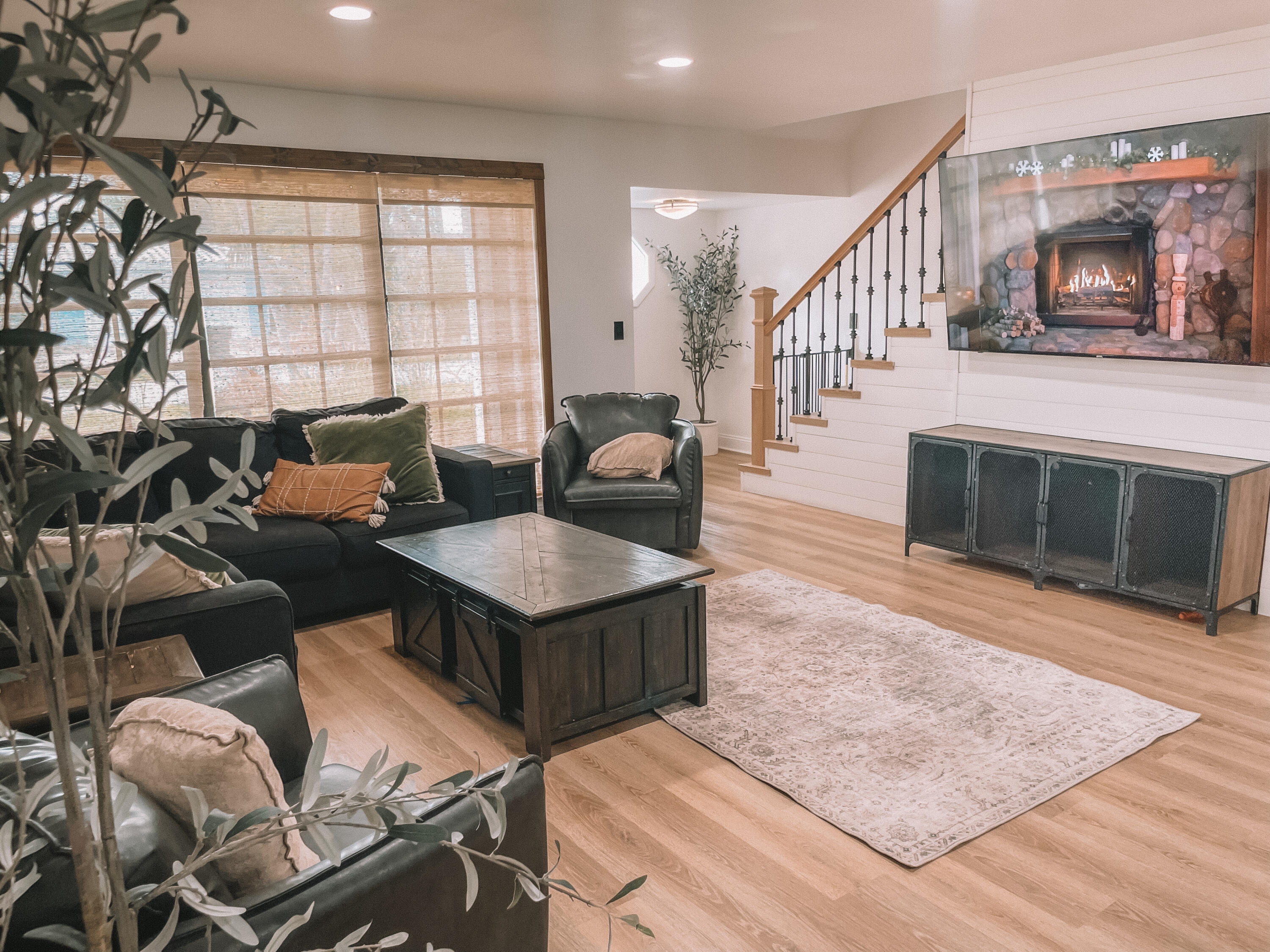 2171 Northeast 44th Court Lighthouse Point, FL 33064 - Photo 2 of 24 a living room with furniture a flat screen tv and a fireplace