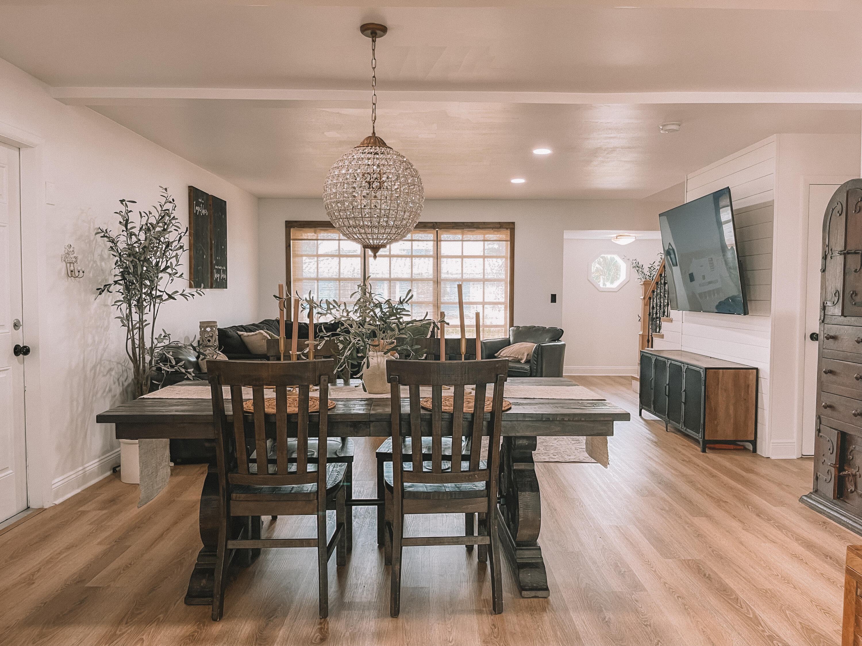 2171 Northeast 44th Court Lighthouse Point, FL 33064 - Photo 5 of 24 a view of a dining room with furniture a chandelier and wooden floor
