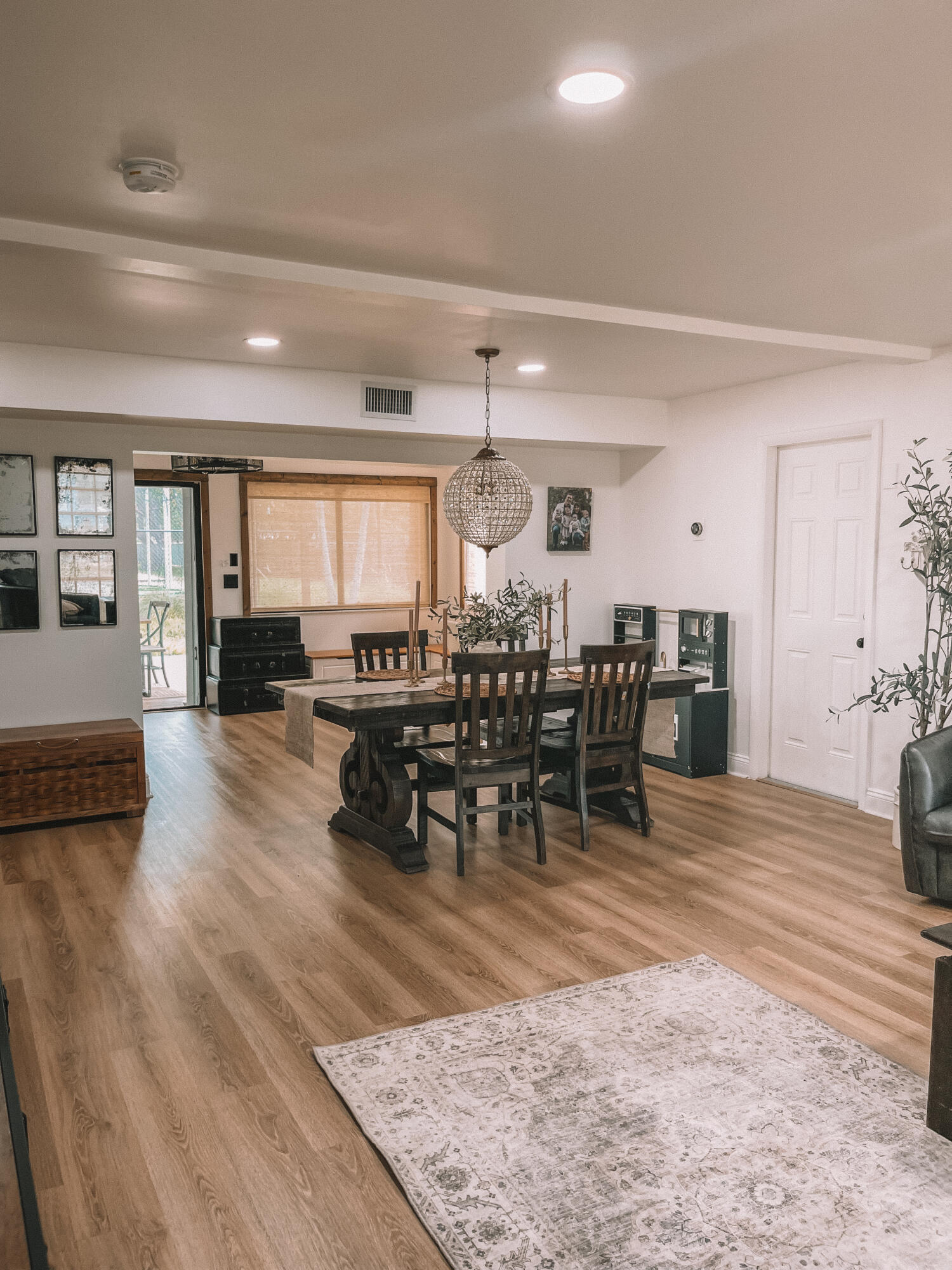 2171 Northeast 44th Court Lighthouse Point, FL 33064 - Photo 6 of 24 a view of a dining room with furniture and wooden floor