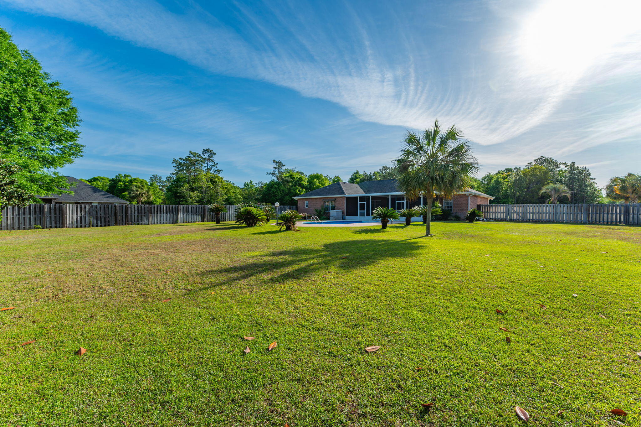 5552 Frontier Drive Crestview, FL 32536 - Photo 48 of 50 a view of a swimming pool with a yard