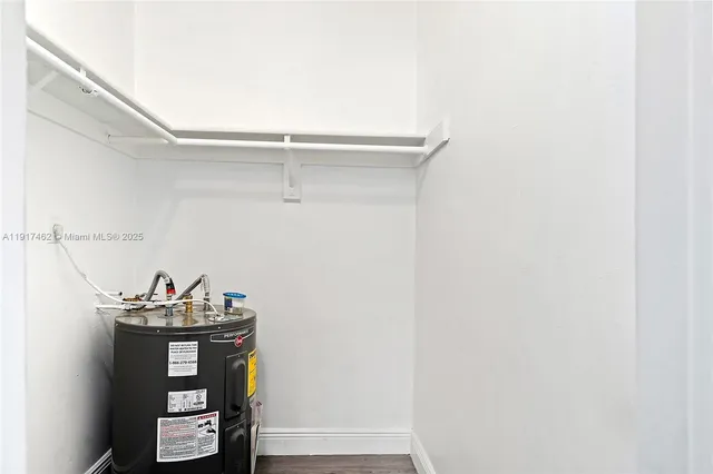 a view of a backyard with table and chairs