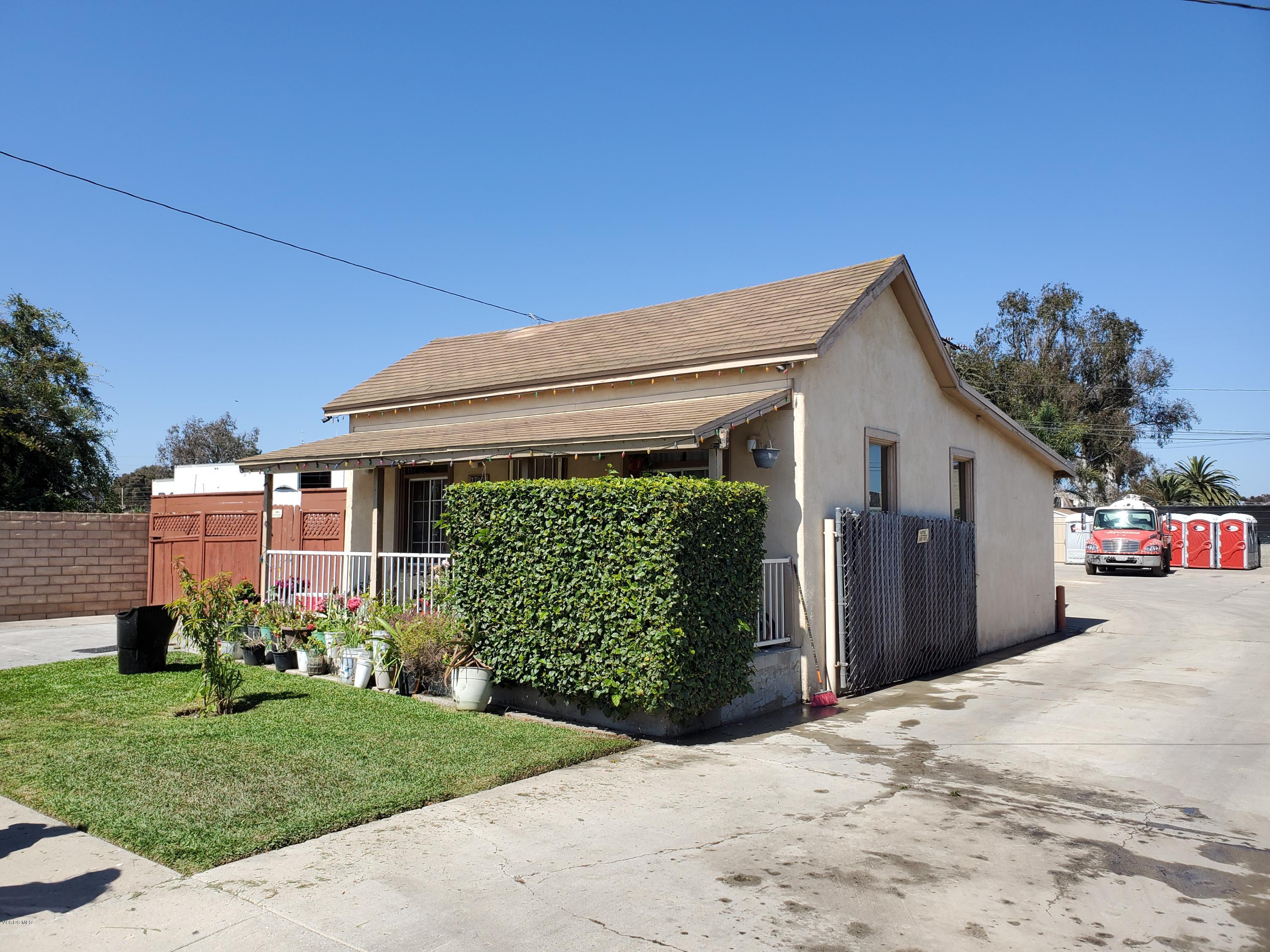 2710 Beene Road Ventura, CA 93003 - Photo 2 of 12 a view of a house with a small yard and a large window
