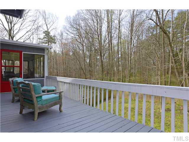 6413 Rushingbrook Drive Raleigh, NC 27612 - Photo 16 of 24 a view of a chair and table in the balcony