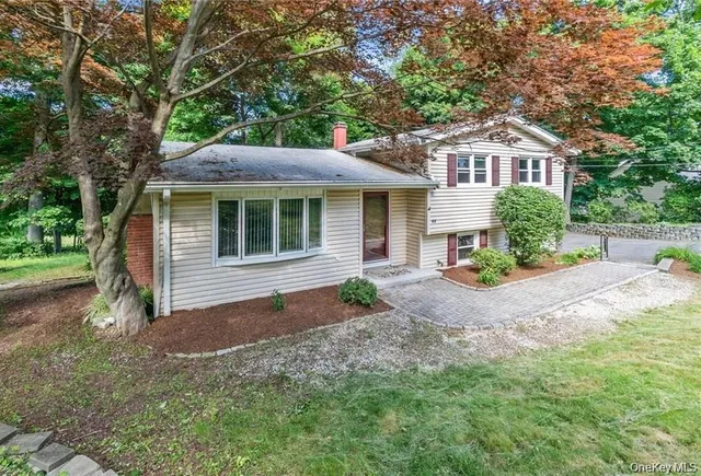 a house view with a garden space