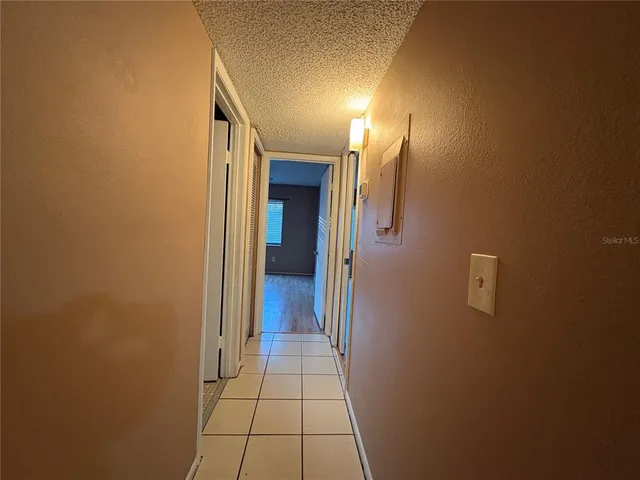 a white refrigerator freezer sitting inside of a kitchen