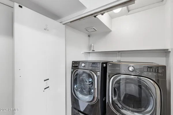 a utility room with dryer and washer