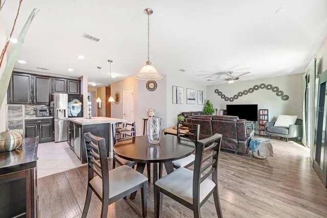 a view of a dining room with furniture