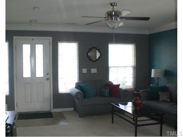 2624 Quarry Springs Road Raleigh, NC 27610 - Photo 3 of 11 a living room with furniture and a window