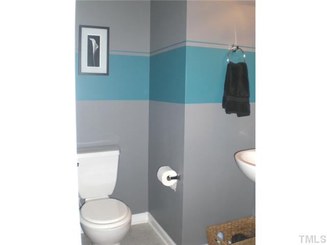 2624 Quarry Springs Road Raleigh, NC 27610 - Photo 4 of 11 a bathroom with a toilet and a shower