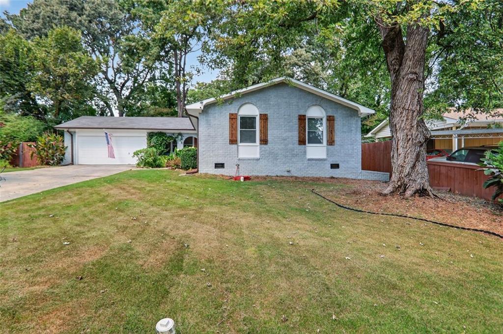 3876 Emerald N Drive Decatur, GA 30035 - Photo 1 of 1 a view of a house with a yard