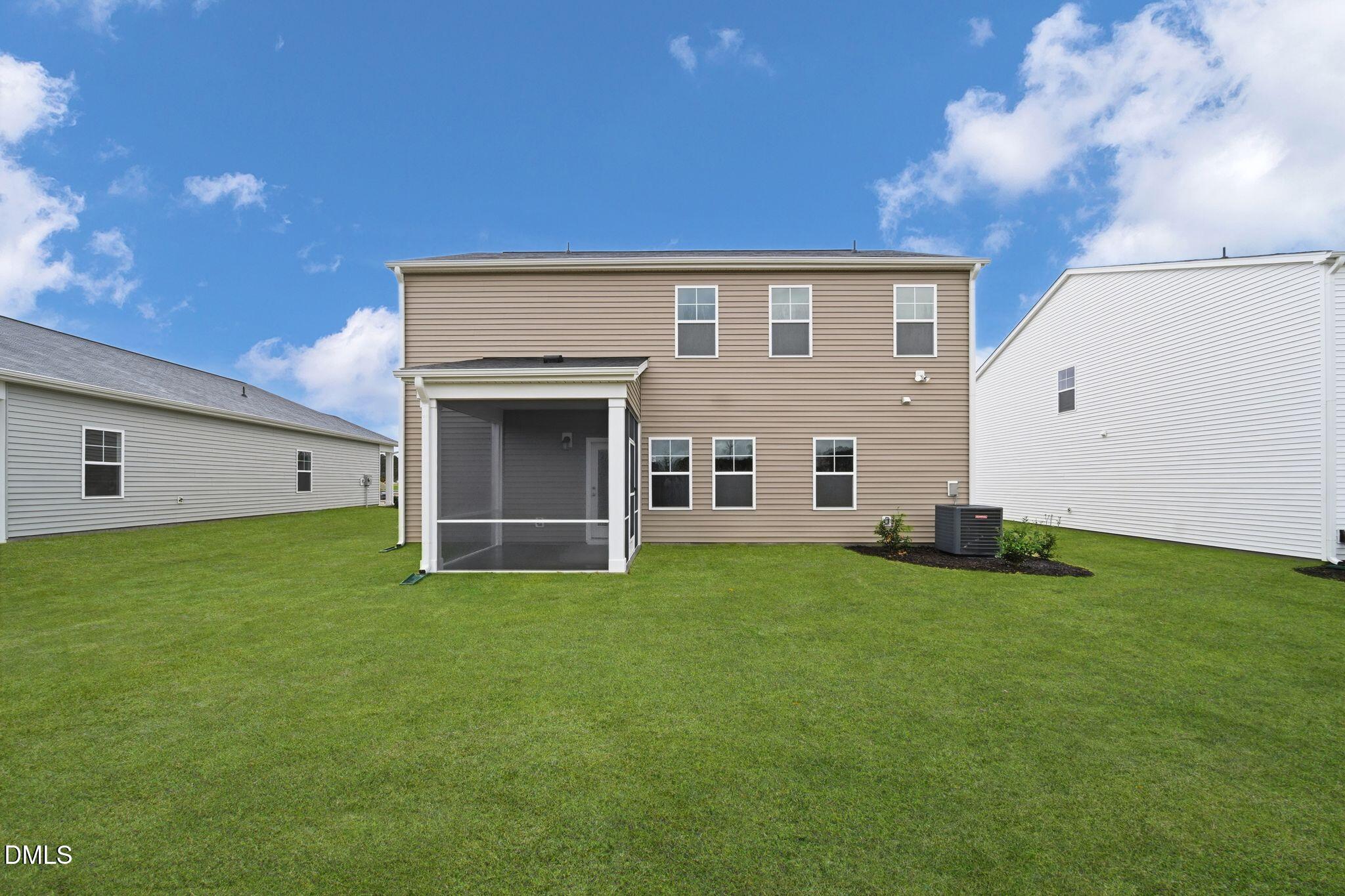 5842 Millstone Way Sims, NC 27880 - Photo 21 of 22 a view of a house with a backyard