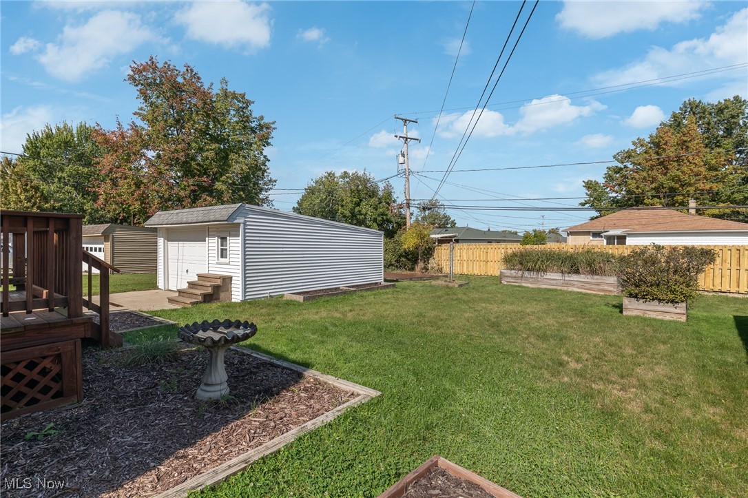 32003 Dickerson Road Willowick, OH 44095 - Photo 24 of 25 View of yard with a storage unit