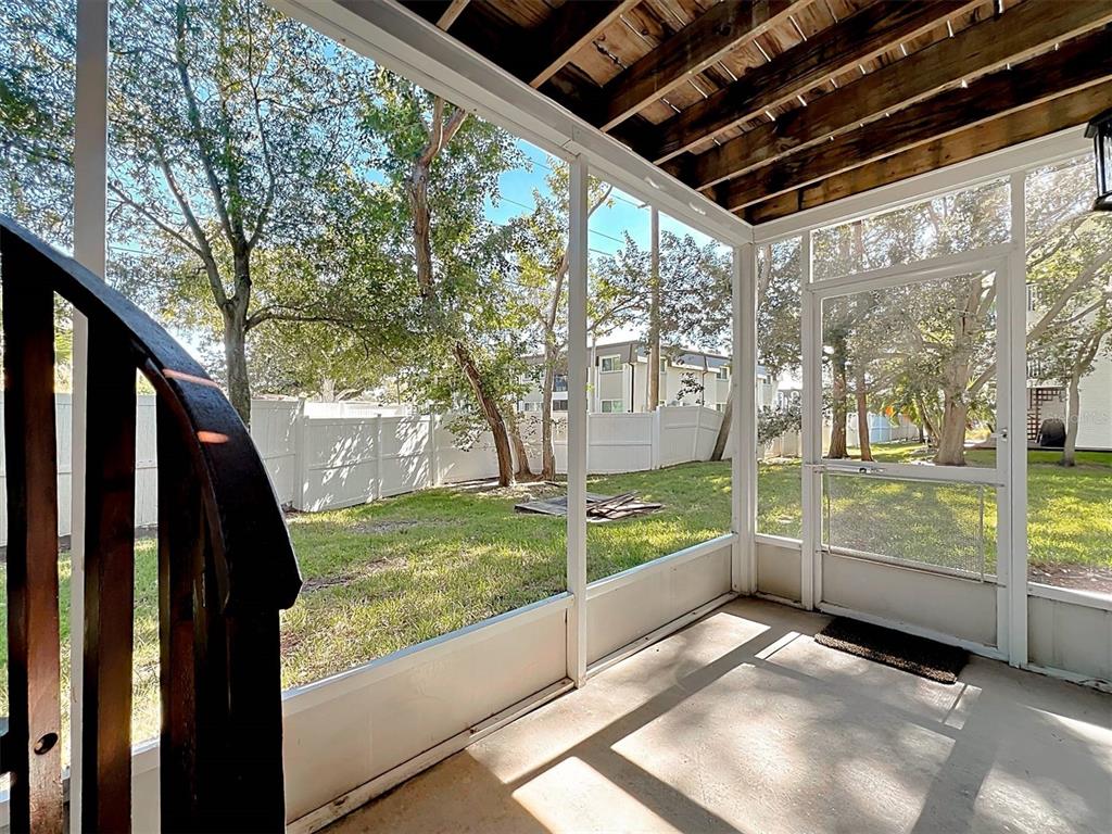 9736 Indian Key Trail, Unit 111 Seminole, FL 33776 - Photo 43 of 56 a view of a porch