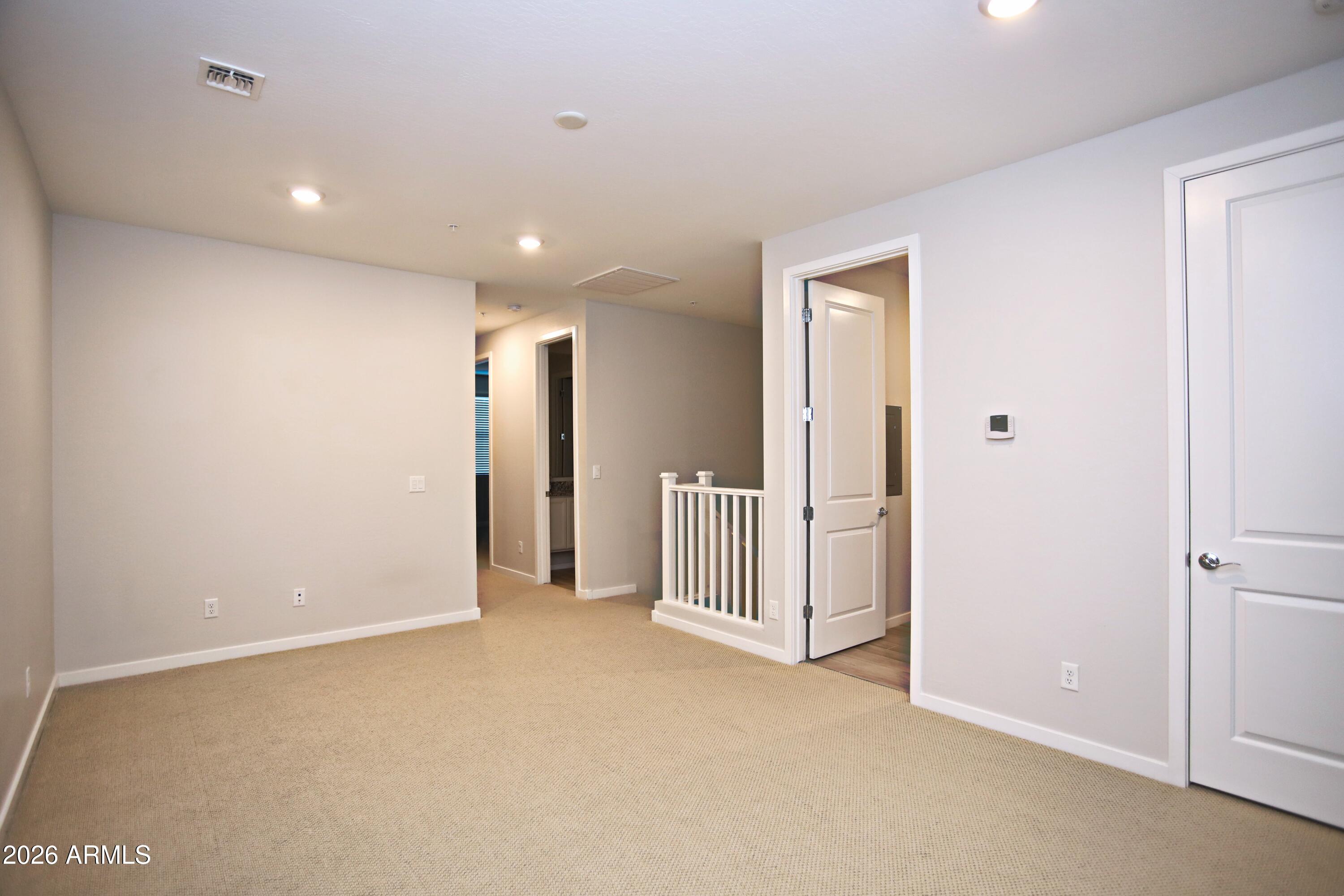 3855 South McQueen Road, Unit 110 Chandler, AZ 85286 - Photo 13 of 37 a view of empty room